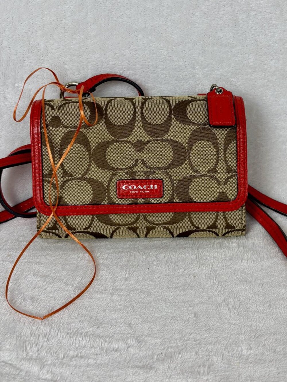 Coach Signature C Canvas Mini Swingpack Bag with Coral Leather Trim